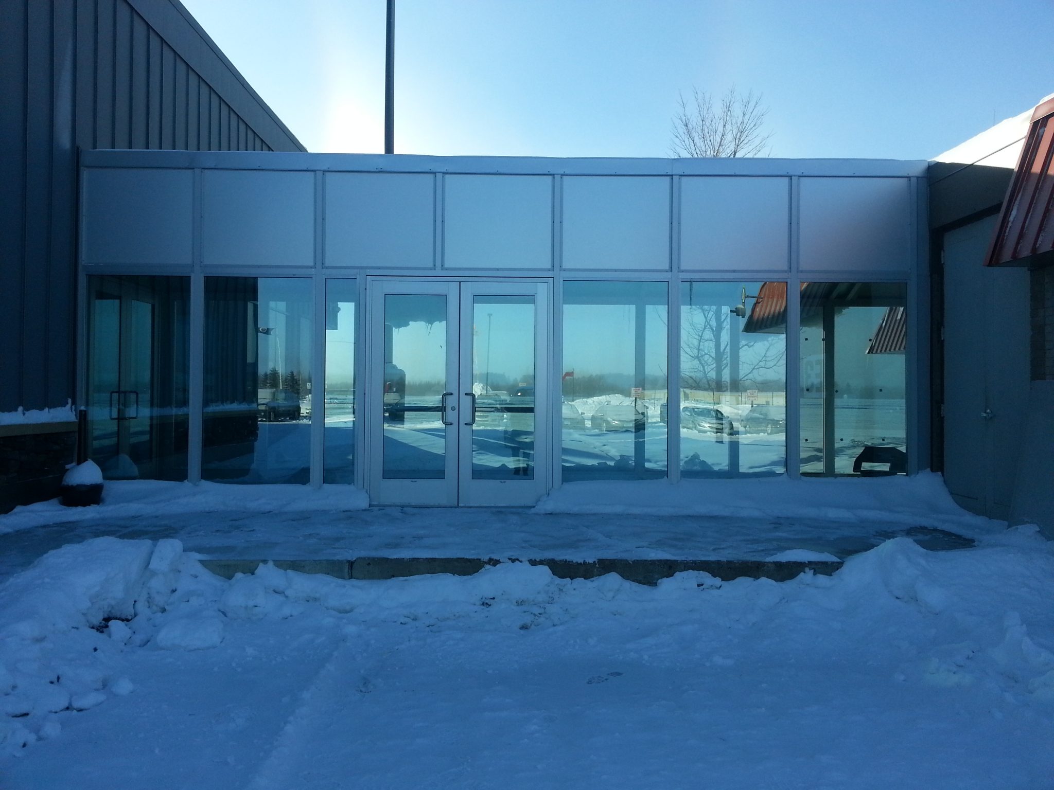 Custom Fully Enclosed Covered Walkway for Anderson Glass Brasco