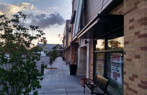 Aluminum Pergola and Matching Storefront Entrance Canopies for Local Retailers